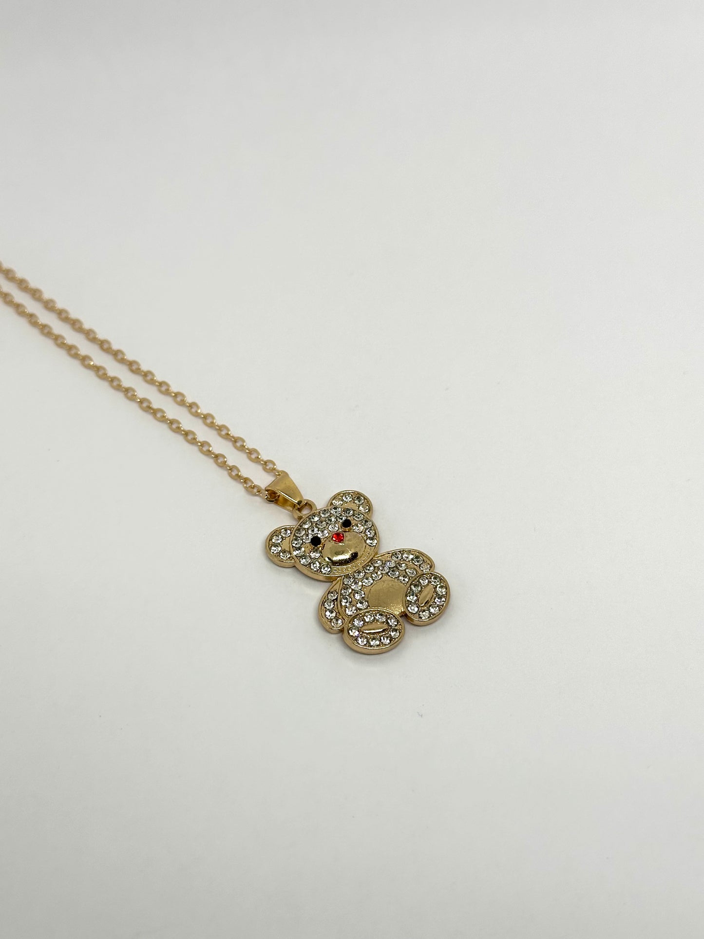 Goudkleurige ketting met beer