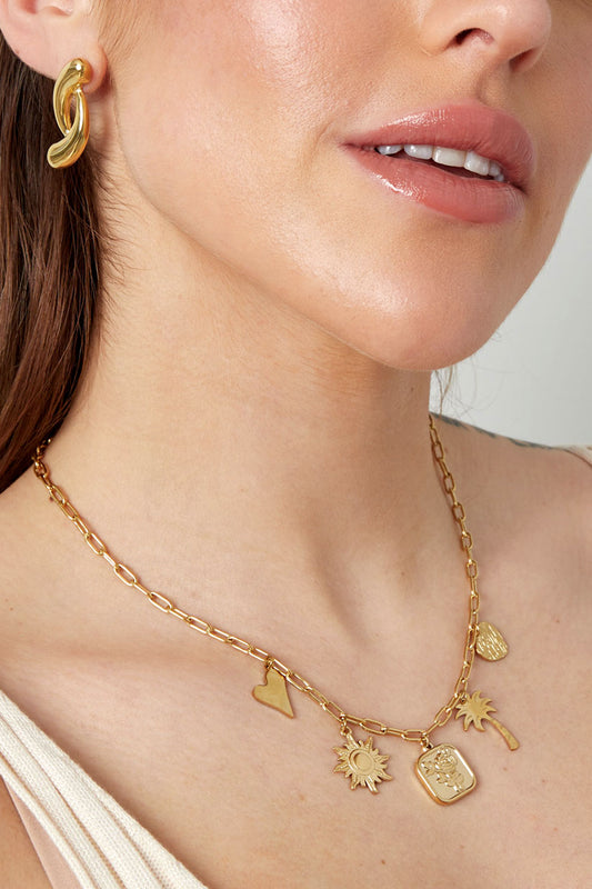 goudkleurige ketting met bedeltjes summer