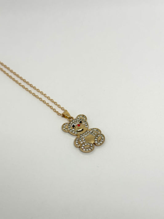 Goudkleurige ketting met beer