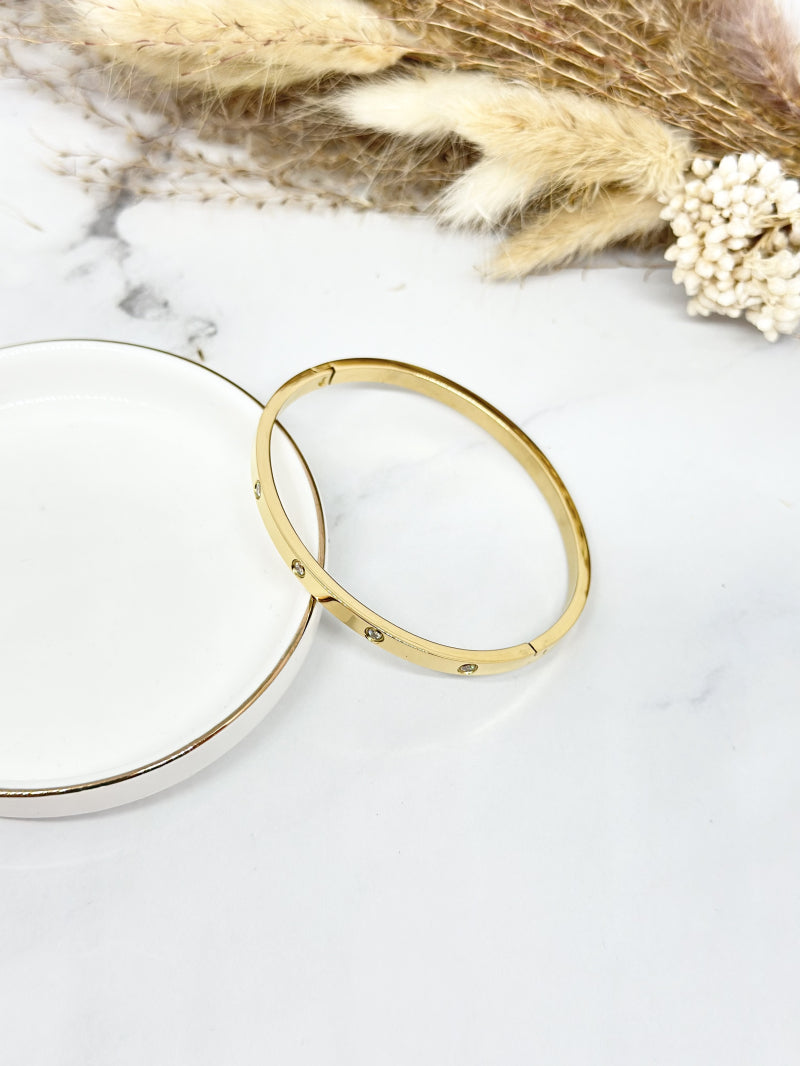love armband goudkleurig met steentjes